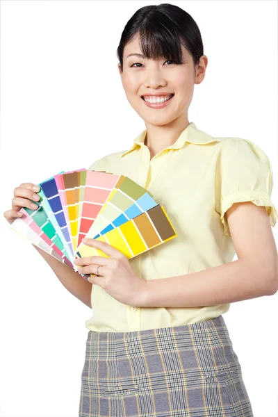 Mulher asiática mostrando gráfico de cores — Fotografia de Stock