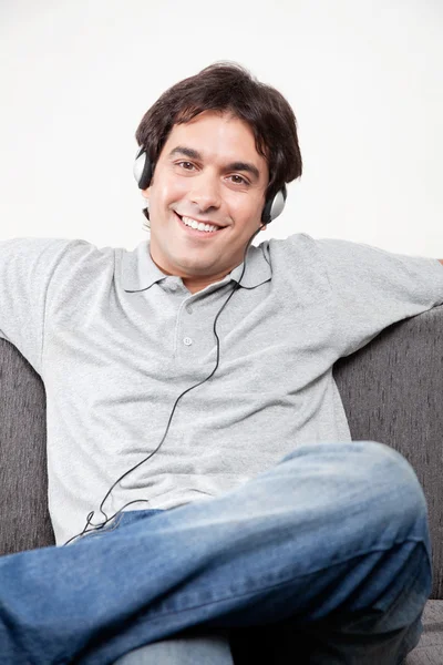 Relaxed Young Man on Couch — Stock Photo, Image