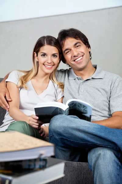 Couple With Book — Stock Photo, Image