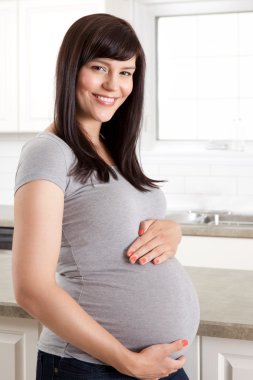 Beautiful Pregnant Woman Holding Belly clipart