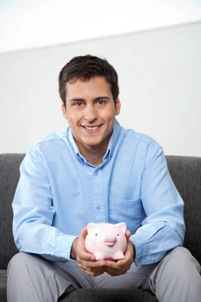 Empresario Holding Piggybank — Foto de Stock