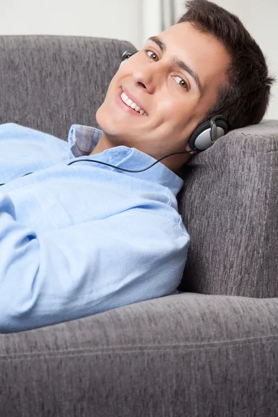Relaxed Young Man on Couch — Stock Photo, Image