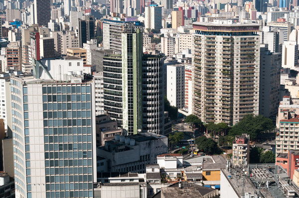 Aerial view of buildings in the neighborhood of the beautiful view in the city of Sao Paulo with emphasis on building viaducts on the right side, designed by John Artacho Jurado.