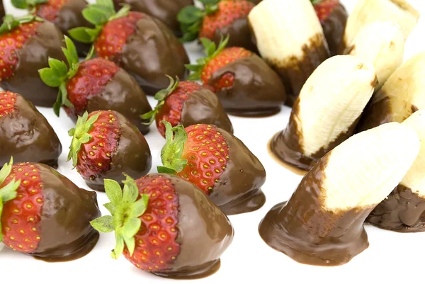 Strawberries bananas and chocolate — Stock Photo, Image