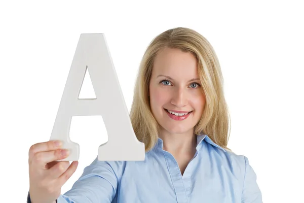 Female holding the letter A — Stock Photo, Image