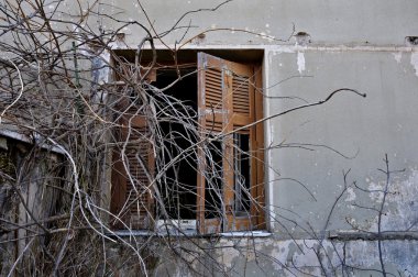 Peeling wall and broken window shutter clipart