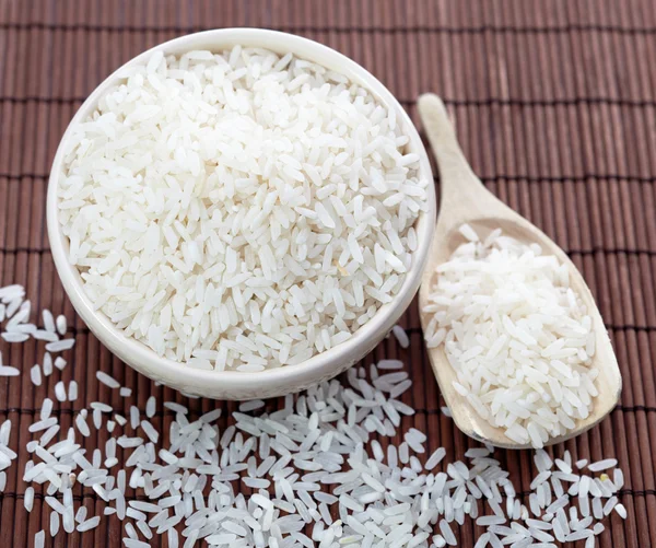 Cuenco y cuchara de arroz — Foto de Stock