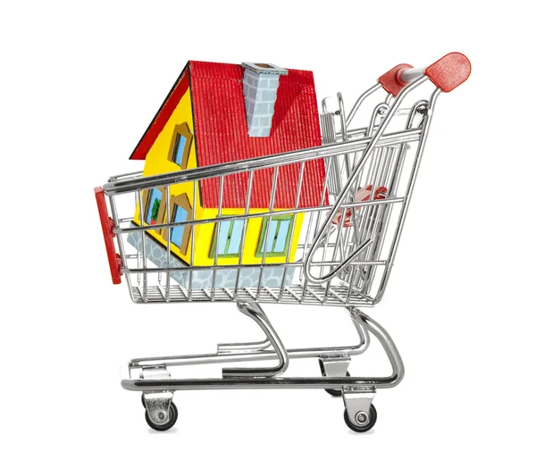 House in a shopping cart isolated — Stock Photo, Image