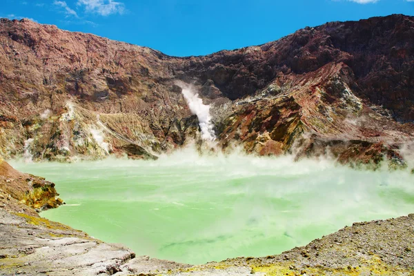 Hot acid lake in volcanic crater — Stock Photo, Image