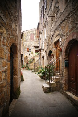 Small backstreet in an italian village clipart