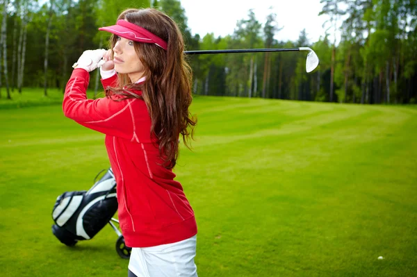 Žena a golf — Stock fotografie