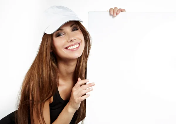 Sexy Frau hält eine leere Plakatwand. — Stockfoto