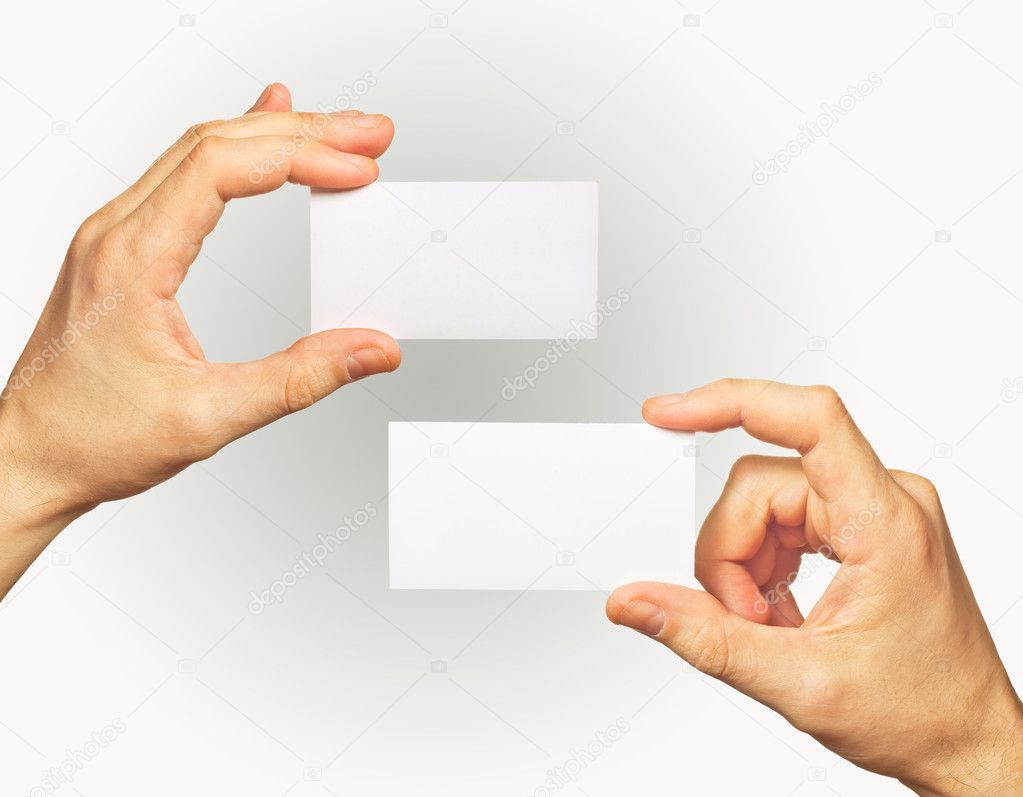 Business card in hands