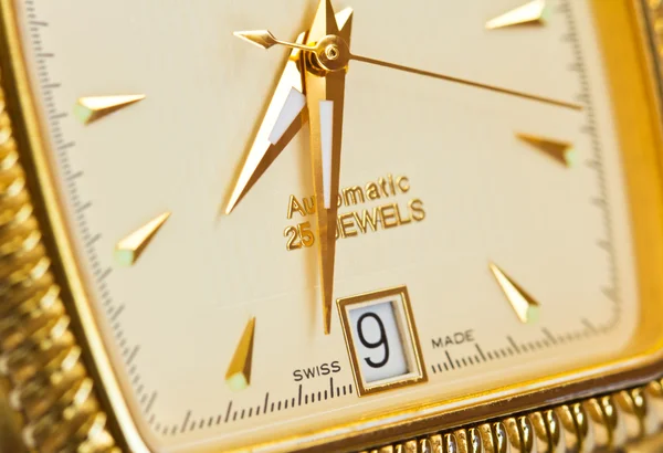 Gold swiss watch close up — Stock Photo, Image
