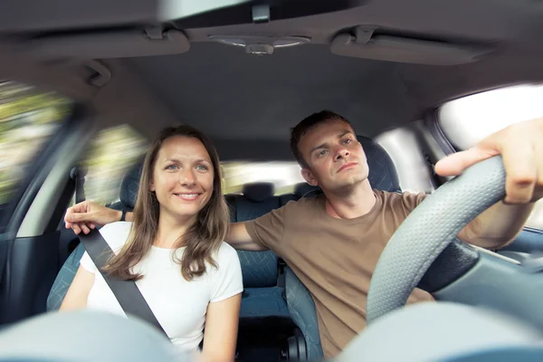 stock image Young couple in a car