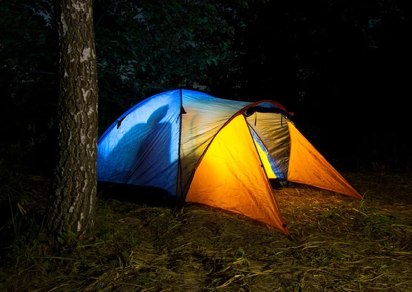 stock image Tent illuminated from the inside