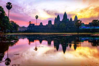 Sunrise at angkor wat temple clipart