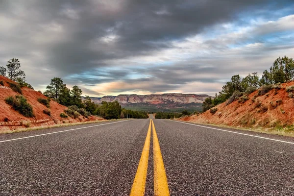 Landscapes with road after sunset — Stock Photo, Image