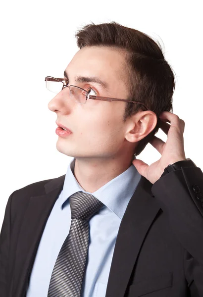 Fiatal üzletember szemüveg gondolkodás — Stock Fotó