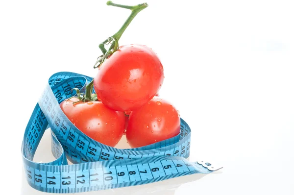 Tomat med mätning — Stockfoto