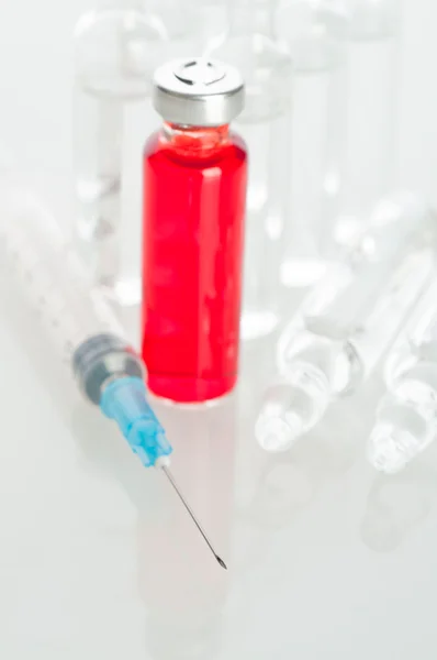 Stock image Medicine vials and syringe