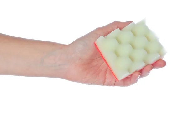 Gloved hand holding a kitchen sponge isolated on a white backgro — Stock Photo, Image