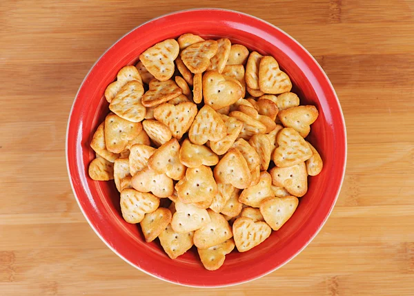 Red plate of cookies — Stock Photo, Image