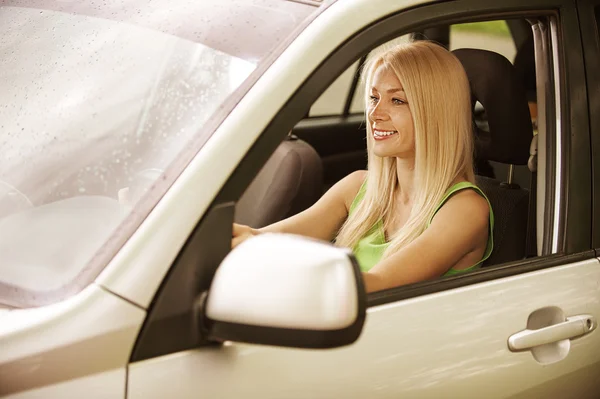 Young woman in car — Stock Photo, Image