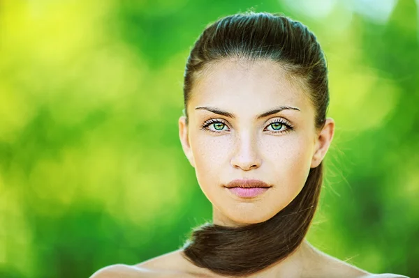 Portrait of young beautiful woman with bare shoulders — Stock Photo, Image
