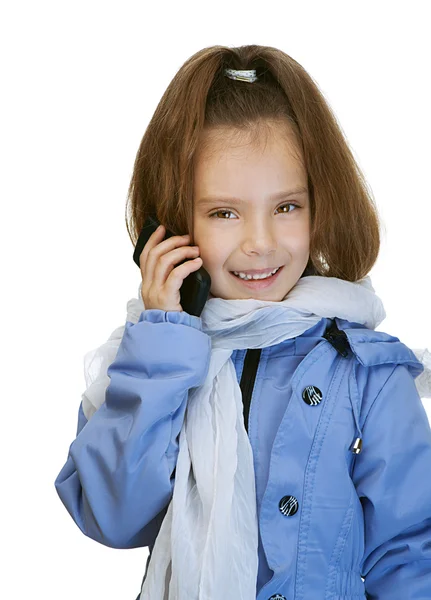 Девочка-дошкольница в синей куртке — стоковое фото