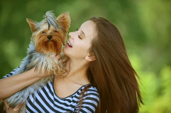 Smiling woman with Yorkshire Terrier — Stock Photo, Image