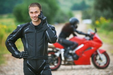 Young male motorcyclist clipart