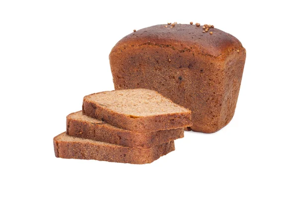 Bochenek chleba i kawałki chleba żytniego — Zdjęcie stockowe