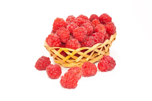 Berries of ripe raspberry in the wattled vase — Stock Photo, Image