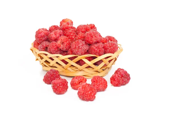 Berries of raspberry in the wattled vase — Stock Photo, Image