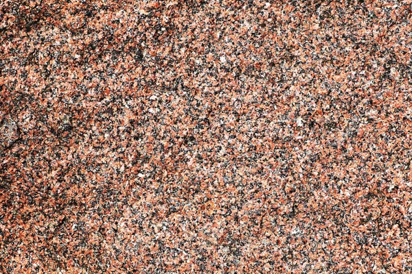 Closeup της επιφάνειας κοκκινωπό γρανίτη μπλοκ — Φωτογραφία Αρχείου