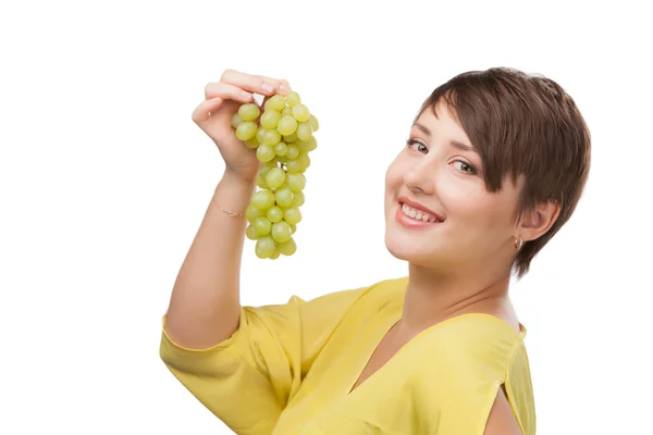 Portrait of attractive smiling girl with grapes — Stock Photo, Image