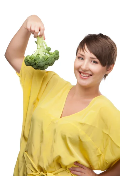 Portrait of a beautiful smiling woman with broccoli — Stock Photo, Image