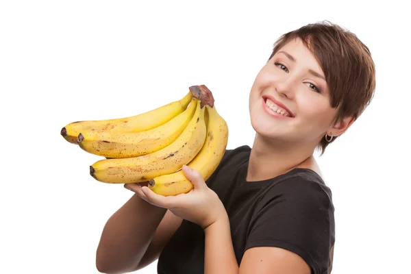 Porträtt av attraktiva leende kvinna studio skott med banan — Stockfoto