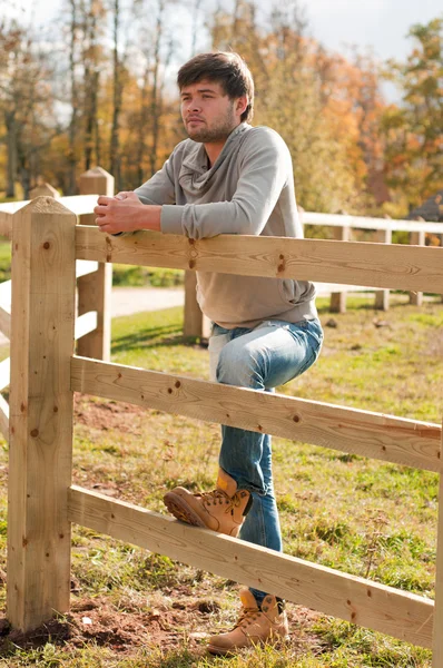 Portrait of young man in country field — Stock Photo, Image