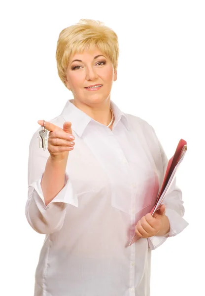 Senior woman with folder and keys — Stock Photo, Image