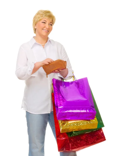 Mulher sênior com bolsas e carteira — Fotografia de Stock