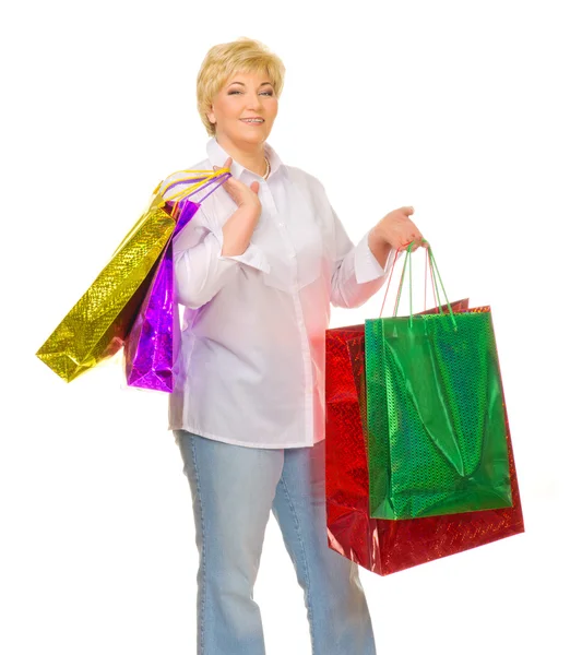 Senior woman with bags — Stock Photo, Image