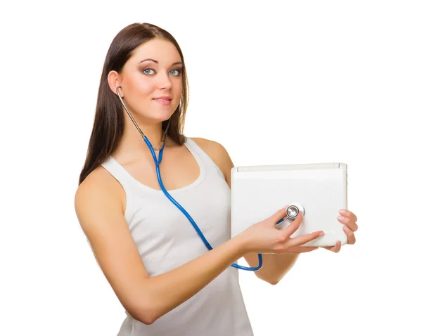 Young girl with laptop and stethoscope — Stock Photo, Image