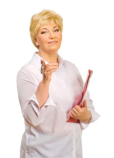 Senior woman with keys and folder — Stock Photo, Image