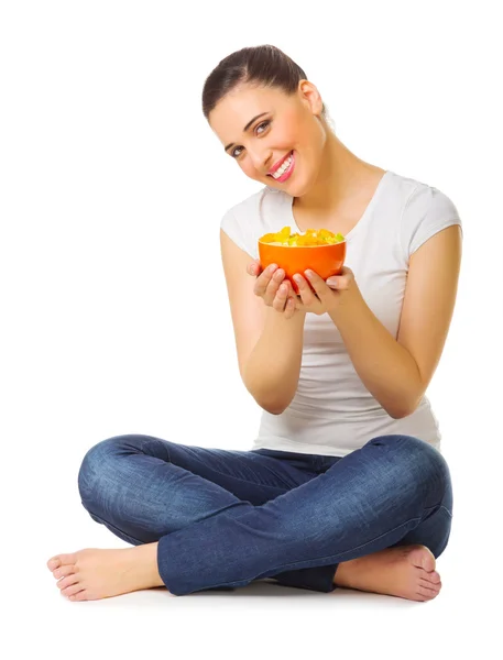 Menina sorrindo jovem com salada de frutas — Fotografia de Stock
