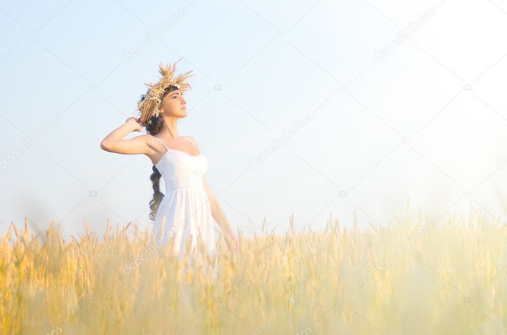 Woman on wheat field