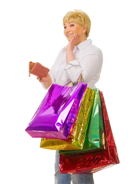 Mulher sênior com bolsas e carteira — Fotografia de Stock
