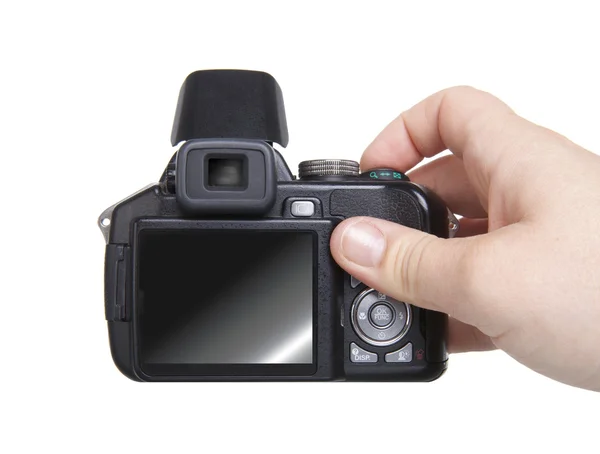 Hand holding camera isolated over white — Stock Photo, Image