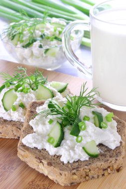 Sandwich with cottage cheese, cucumber and chives clipart